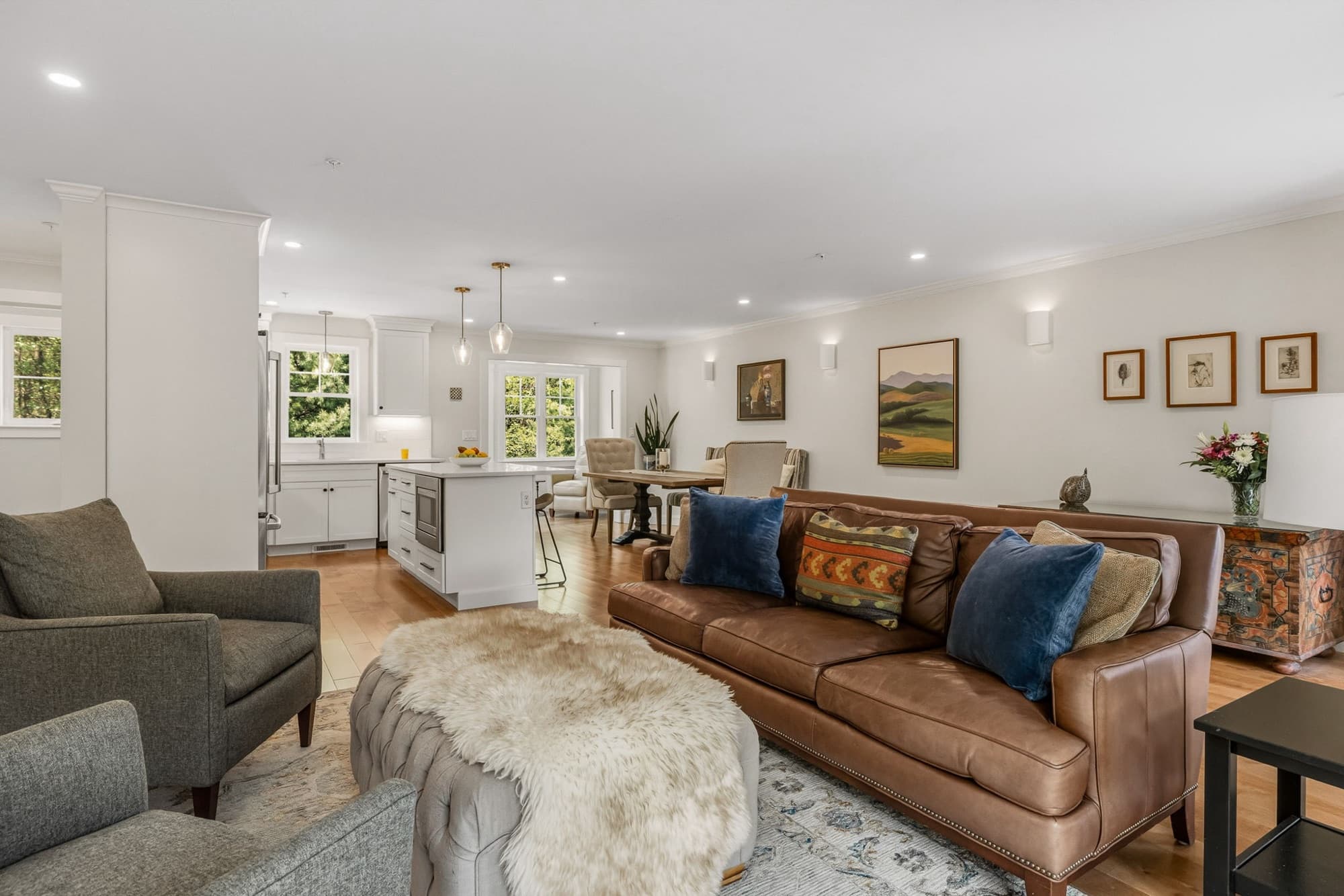 Open-concept living room flowing into the kitchen