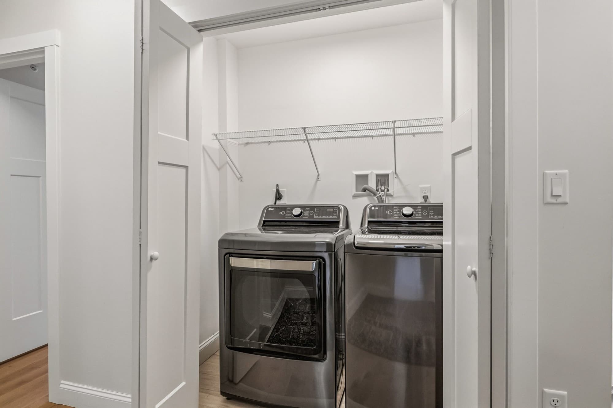 Laundry area with a full-size washer and dryer
