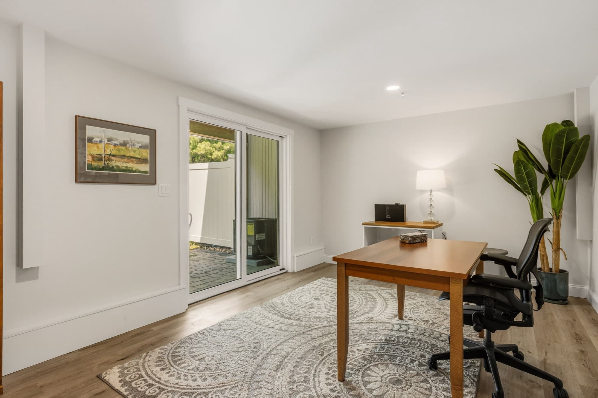 Lower-level bonus room with sliding-door access