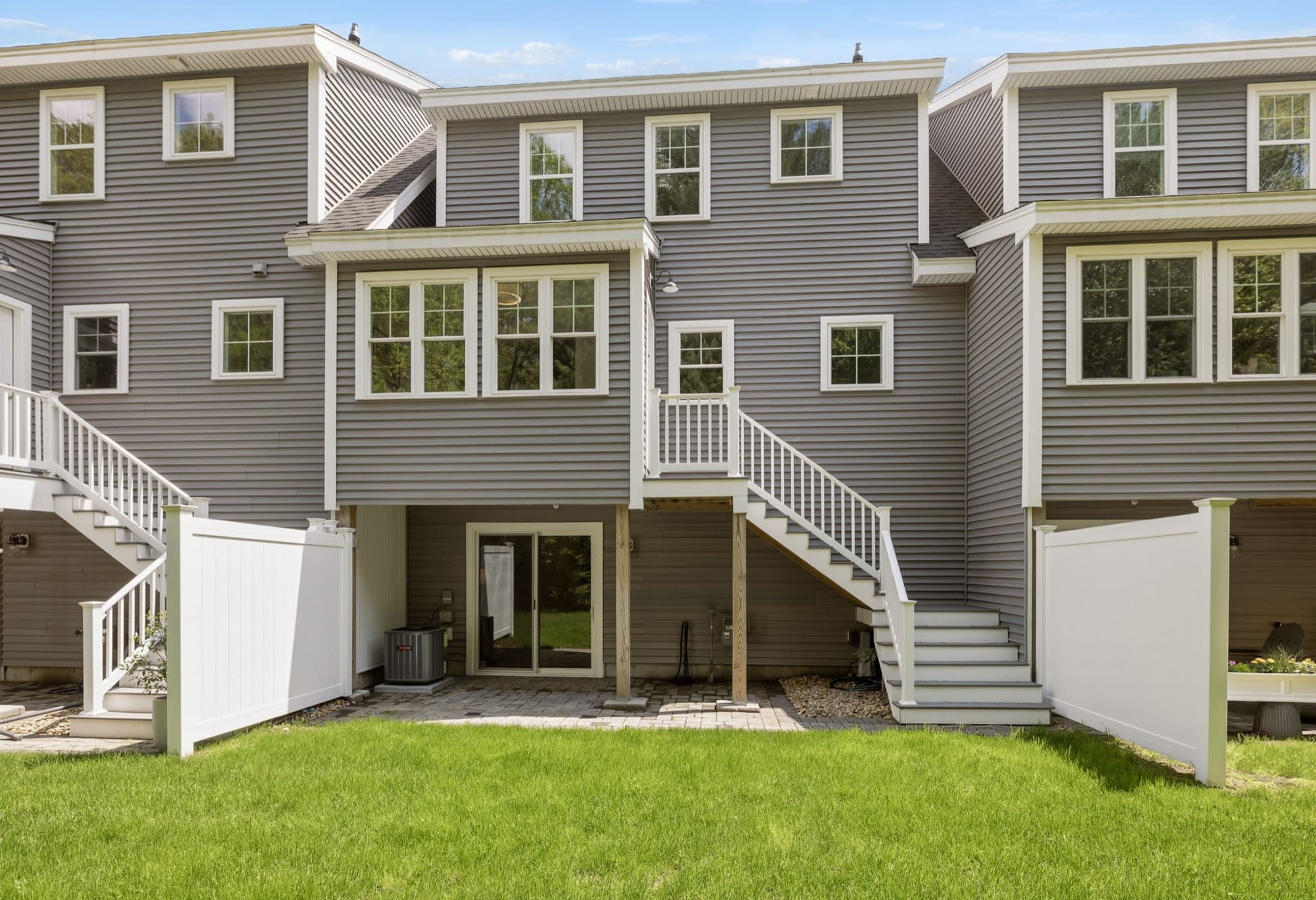 Rear exterior with the deck and yard