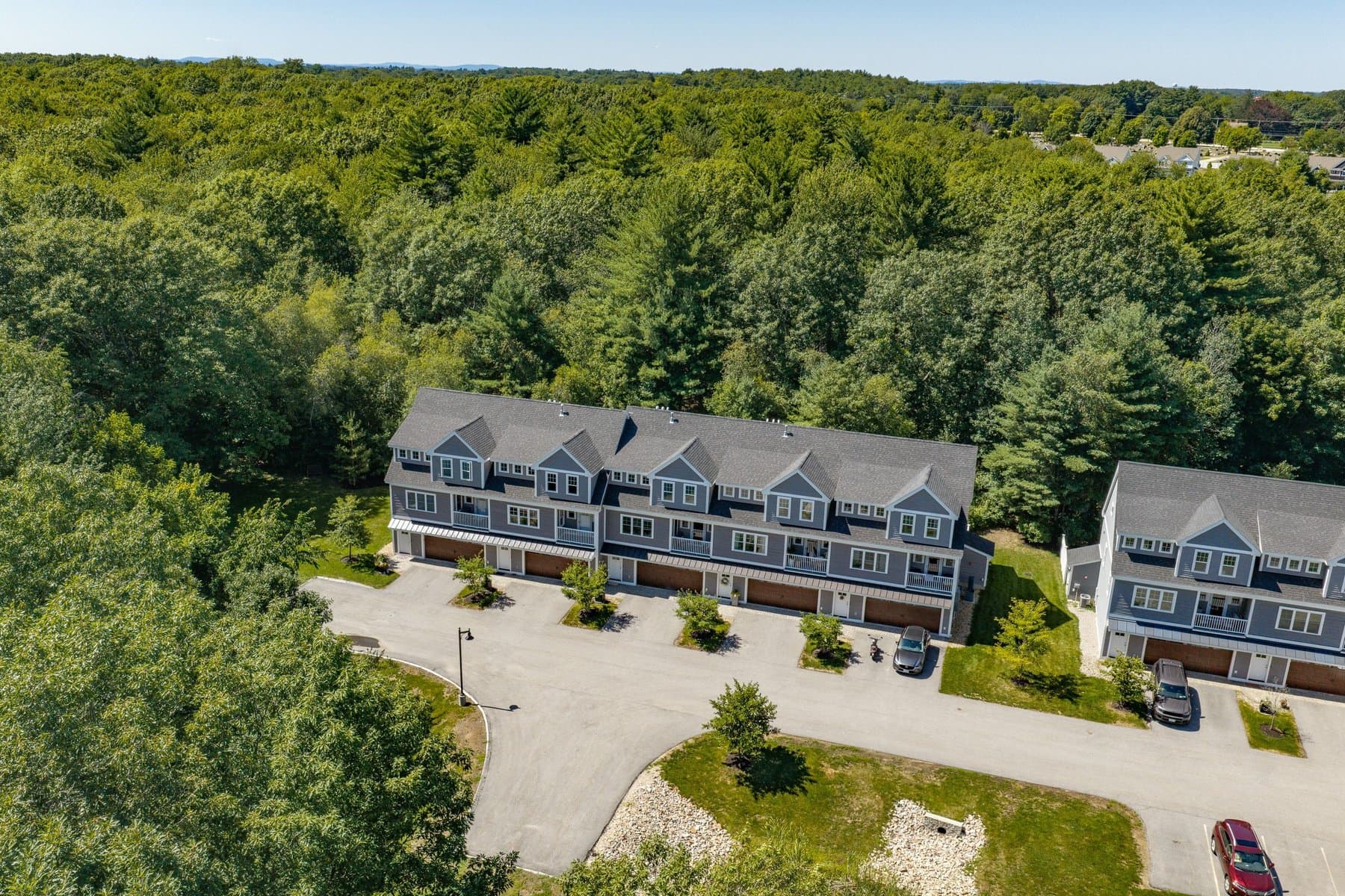 Aerial view of the front of the Peverly Hill Estates row and driveway